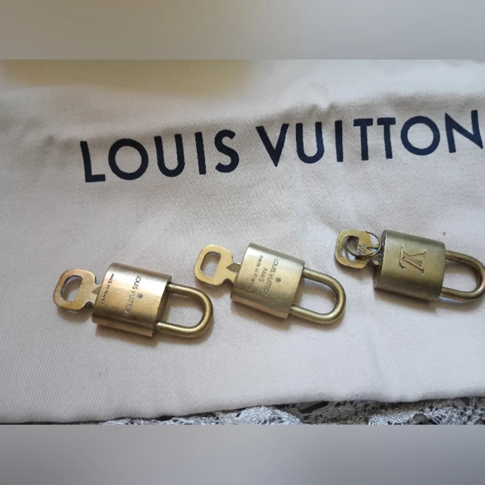 Authentic Louis Vuitton Lock & Key # 310 - Picture 8 of 11